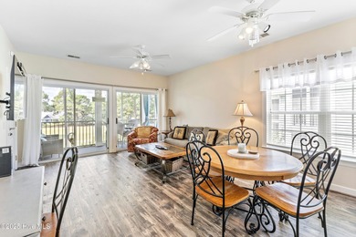 Discover easy coastal living in this spacious condo located in on Sea Trail Golf Resort in North Carolina - for sale on GolfHomes.com, golf home, golf lot