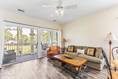 Discover easy coastal living in this spacious condo located in on Sea Trail Golf Resort in North Carolina - for sale on GolfHomes.com, golf home, golf lot