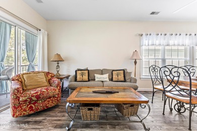 Discover easy coastal living in this spacious condo located in on Sea Trail Golf Resort in North Carolina - for sale on GolfHomes.com, golf home, golf lot