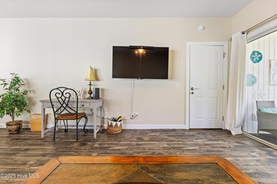 Discover easy coastal living in this spacious condo located in on Sea Trail Golf Resort in North Carolina - for sale on GolfHomes.com, golf home, golf lot