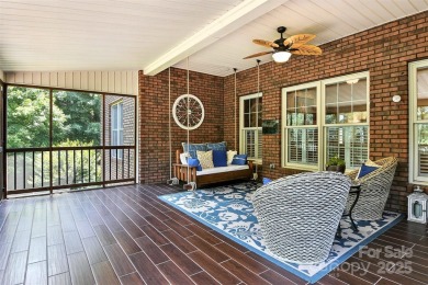 Stunning executive brick home in the gated Rock Barn Golf on Rock Barn Golf and Spa in North Carolina - for sale on GolfHomes.com, golf home, golf lot