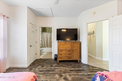 Discover easy coastal living in this spacious condo located in on Sea Trail Golf Resort in North Carolina - for sale on GolfHomes.com, golf home, golf lot