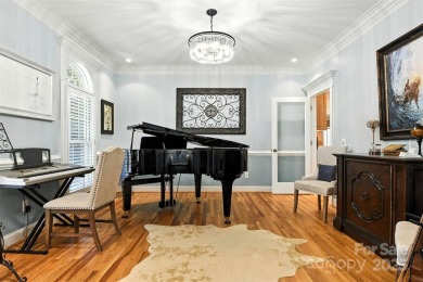 Stunning executive brick home in the gated Rock Barn Golf on Rock Barn Golf and Spa in North Carolina - for sale on GolfHomes.com, golf home, golf lot