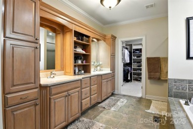 Stunning executive brick home in the gated Rock Barn Golf on Rock Barn Golf and Spa in North Carolina - for sale on GolfHomes.com, golf home, golf lot