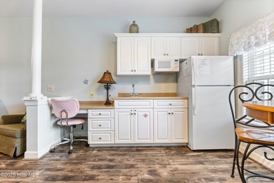 Discover easy coastal living in this spacious condo located in on Sea Trail Golf Resort in North Carolina - for sale on GolfHomes.com, golf home, golf lot