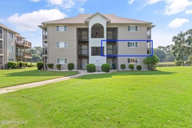 Expansive golf and water views abound in this spacious condo on Oyster Bay Golf Links in North Carolina - for sale on GolfHomes.com, golf home, golf lot