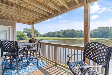 Expansive golf and water views abound in this spacious condo on Oyster Bay Golf Links in North Carolina - for sale on GolfHomes.com, golf home, golf lot