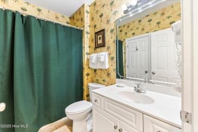 Discover easy coastal living in this spacious condo located in on Sea Trail Golf Resort in North Carolina - for sale on GolfHomes.com, golf home, golf lot