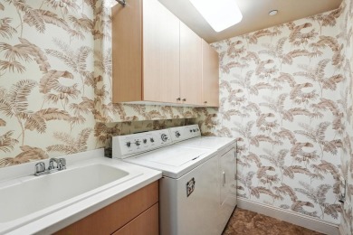 Experience luxury coastal living at its finest in this exquisite on Hammock Dunes Club in Florida - for sale on GolfHomes.com, golf home, golf lot