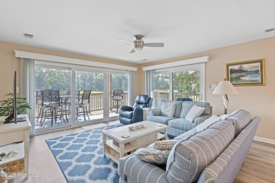 Expansive golf and water views abound in this spacious condo on Oyster Bay Golf Links in North Carolina - for sale on GolfHomes.com, golf home, golf lot