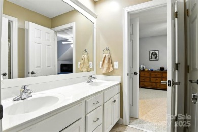 Stunning executive brick home in the gated Rock Barn Golf on Rock Barn Golf and Spa in North Carolina - for sale on GolfHomes.com, golf home, golf lot