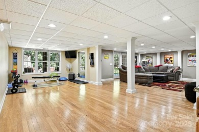 Stunning executive brick home in the gated Rock Barn Golf on Rock Barn Golf and Spa in North Carolina - for sale on GolfHomes.com, golf home, golf lot