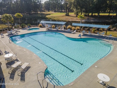 Discover easy coastal living in this spacious condo located in on Sea Trail Golf Resort in North Carolina - for sale on GolfHomes.com, golf home, golf lot