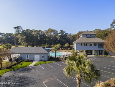 Discover easy coastal living in this spacious condo located in on Sea Trail Golf Resort in North Carolina - for sale on GolfHomes.com, golf home, golf lot