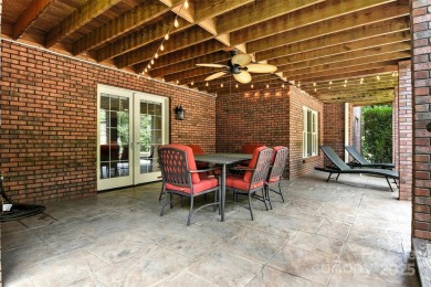 Stunning executive brick home in the gated Rock Barn Golf on Rock Barn Golf and Spa in North Carolina - for sale on GolfHomes.com, golf home, golf lot
