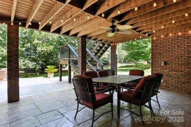 Stunning executive brick home in the gated Rock Barn Golf on Rock Barn Golf and Spa in North Carolina - for sale on GolfHomes.com, golf home, golf lot