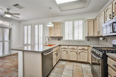 Nestled on a peaceful cul-de-sac in Sun City MacDonald Ranch 55+ on Desert Willow Golf Course in Nevada - for sale on GolfHomes.com, golf home, golf lot