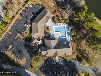 Discover easy coastal living in this spacious condo located in on Sea Trail Golf Resort in North Carolina - for sale on GolfHomes.com, golf home, golf lot