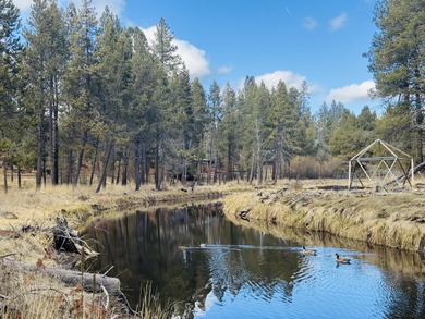 A prime canal homesite, this 0.64-acre lot backs directly to the on Crosswater Club At Sunriver in Oregon - for sale on GolfHomes.com, golf home, golf lot