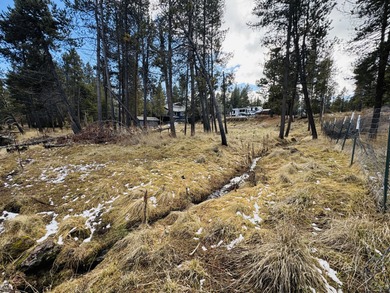 A prime canal homesite, this 0.64-acre lot backs directly to the on Crosswater Club At Sunriver in Oregon - for sale on GolfHomes.com, golf home, golf lot