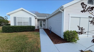 This 2-bedroom, 2-bath Amelia model home in Del Webb Spruce on Eagle Ridge At Spruce Creek Country Club in Florida - for sale on GolfHomes.com, golf home, golf lot