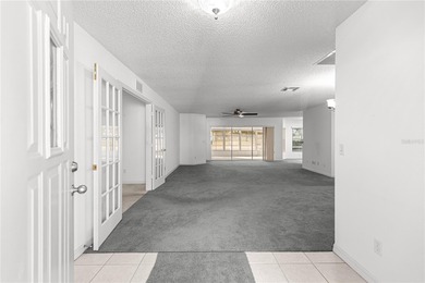 This Hanover model home is located in the much sought after 55+ on On Top of the World Golf Course in Florida - for sale on GolfHomes.com, golf home, golf lot