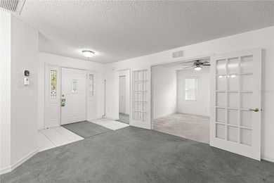 This Hanover model home is located in the much sought after 55+ on On Top of the World Golf Course in Florida - for sale on GolfHomes.com, golf home, golf lot