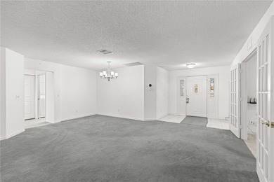 This Hanover model home is located in the much sought after 55+ on On Top of the World Golf Course in Florida - for sale on GolfHomes.com, golf home, golf lot