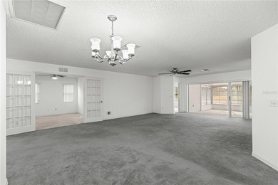 This Hanover model home is located in the much sought after 55+ on On Top of the World Golf Course in Florida - for sale on GolfHomes.com, golf home, golf lot