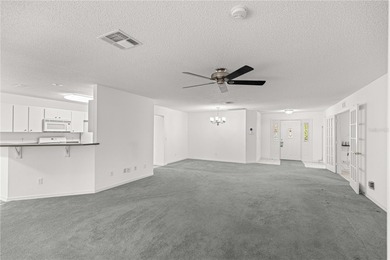 This Hanover model home is located in the much sought after 55+ on On Top of the World Golf Course in Florida - for sale on GolfHomes.com, golf home, golf lot