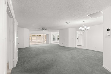 This Hanover model home is located in the much sought after 55+ on On Top of the World Golf Course in Florida - for sale on GolfHomes.com, golf home, golf lot