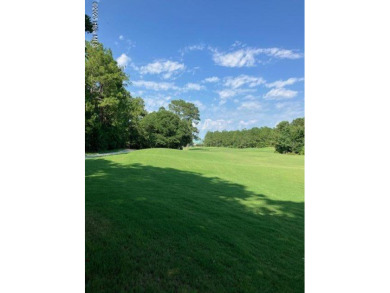 This golf course lot looks down the first fairway of the Ibis on Carolina National Golf Club in North Carolina - for sale on GolfHomes.com, golf home, golf lot