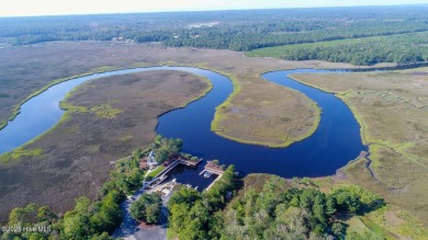This golf course lot looks down the first fairway of the Ibis on Carolina National Golf Club in North Carolina - for sale on GolfHomes.com, golf home, golf lot