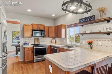 This home shows fantastic! Step into an open living room with on Antler Creek Golf Course in Colorado - for sale on GolfHomes.com, golf home, golf lot