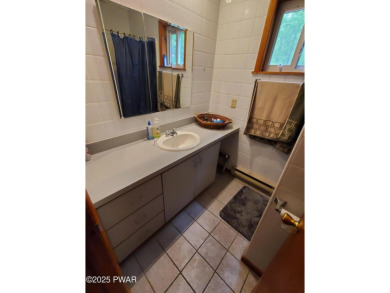 WALK TO LAKE, POOL & BEACH!!  Privately set home in Fawn Lake on Forest Lake Club in Pennsylvania - for sale on GolfHomes.com, golf home, golf lot