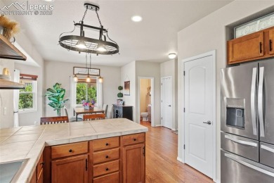 This home shows fantastic! Step into an open living room with on Antler Creek Golf Course in Colorado - for sale on GolfHomes.com, golf home, golf lot