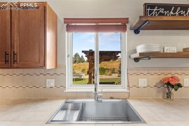 This home shows fantastic! Step into an open living room with on Antler Creek Golf Course in Colorado - for sale on GolfHomes.com, golf home, golf lot