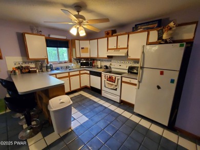 WALK TO LAKE, POOL & BEACH!!  Privately set home in Fawn Lake on Forest Lake Club in Pennsylvania - for sale on GolfHomes.com, golf home, golf lot