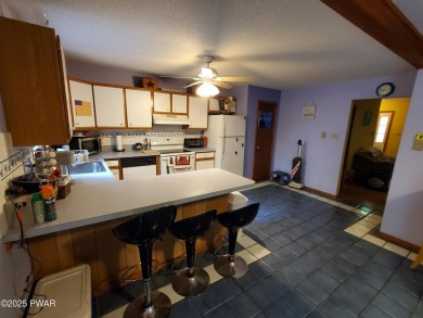 WALK TO LAKE, POOL & BEACH!!  Privately set home in Fawn Lake on Forest Lake Club in Pennsylvania - for sale on GolfHomes.com, golf home, golf lot