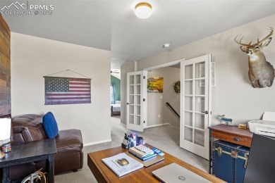 This home shows fantastic! Step into an open living room with on Antler Creek Golf Course in Colorado - for sale on GolfHomes.com, golf home, golf lot