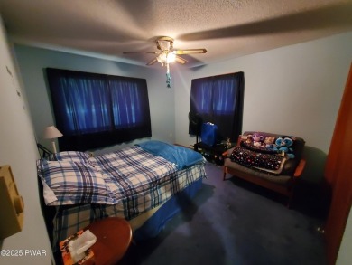 WALK TO LAKE, POOL & BEACH!!  Privately set home in Fawn Lake on Forest Lake Club in Pennsylvania - for sale on GolfHomes.com, golf home, golf lot