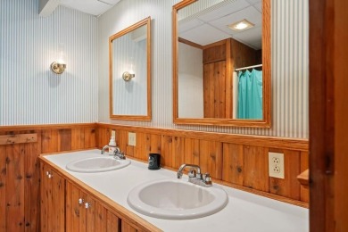 Welcome to 1185 Hideaway Valley Drive, Unit #67, a charming on Little Traverse Bay Golf Club and Restaurant in Michigan - for sale on GolfHomes.com, golf home, golf lot