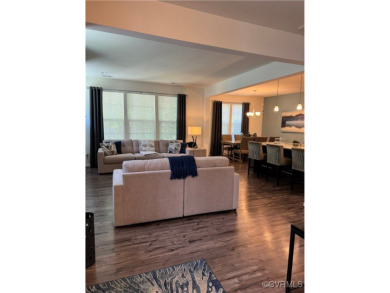 This stunning end-unit townhome in the Magnolia Green community on The Westham Golf Club At Magnolia Green in Virginia - for sale on GolfHomes.com, golf home, golf lot