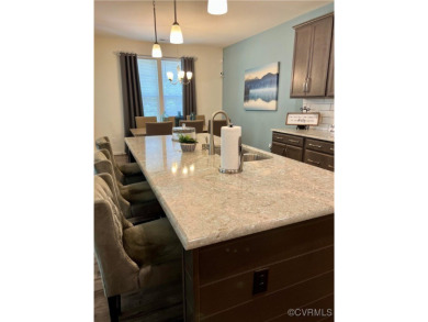 This stunning end-unit townhome in the Magnolia Green community on The Westham Golf Club At Magnolia Green in Virginia - for sale on GolfHomes.com, golf home, golf lot