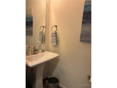 This stunning end-unit townhome in the Magnolia Green community on The Westham Golf Club At Magnolia Green in Virginia - for sale on GolfHomes.com, golf home, golf lot
