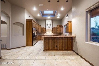 This Solar powered home has breathtaking views of the Organ on Sonoma Ranch Golf Course in New Mexico - for sale on GolfHomes.com, golf home, golf lot