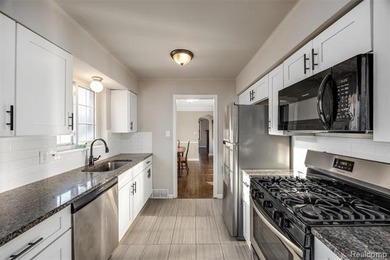 Welcome Home ! This brick bungalow offers an oversized primary on Lochmoor Club in Michigan - for sale on GolfHomes.com, golf home, golf lot