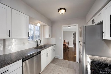 Welcome Home ! This brick bungalow offers an oversized primary on Lochmoor Club in Michigan - for sale on GolfHomes.com, golf home, golf lot