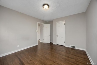 Welcome Home ! This brick bungalow offers an oversized primary on Lochmoor Club in Michigan - for sale on GolfHomes.com, golf home, golf lot