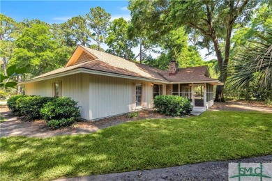 Tucked behind private gates and nestled on a well-manicured on The Landings Club - Magnolia in Georgia - for sale on GolfHomes.com, golf home, golf lot